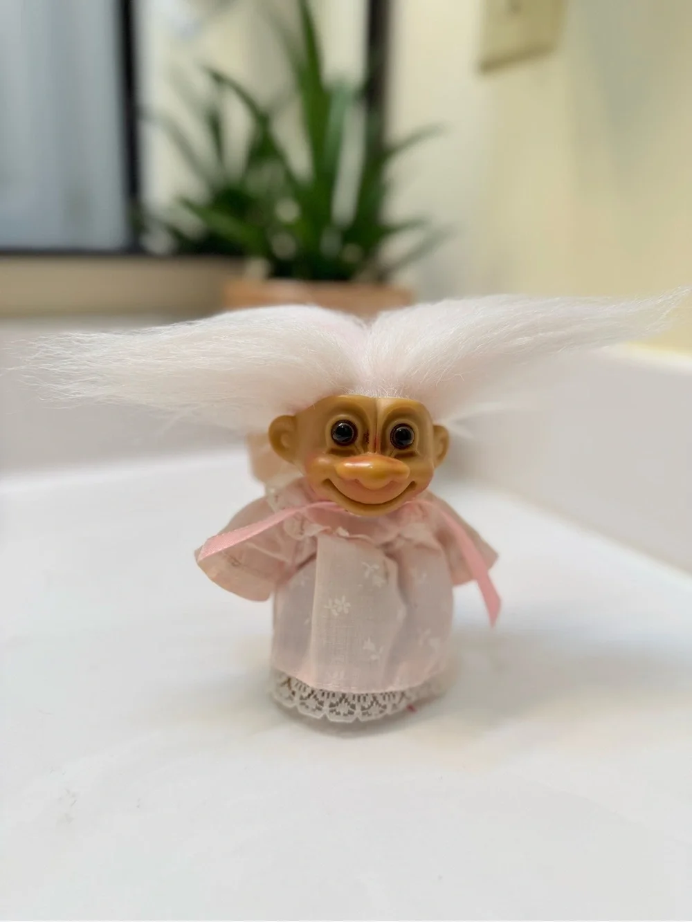 Russ Pink-Clad Baby Troll with White Hair Bath Toy